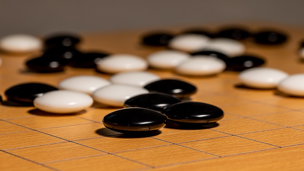 Go stones on a board — the game where a machine learned to beat human intuition